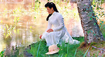 Vietnamese woman by pond